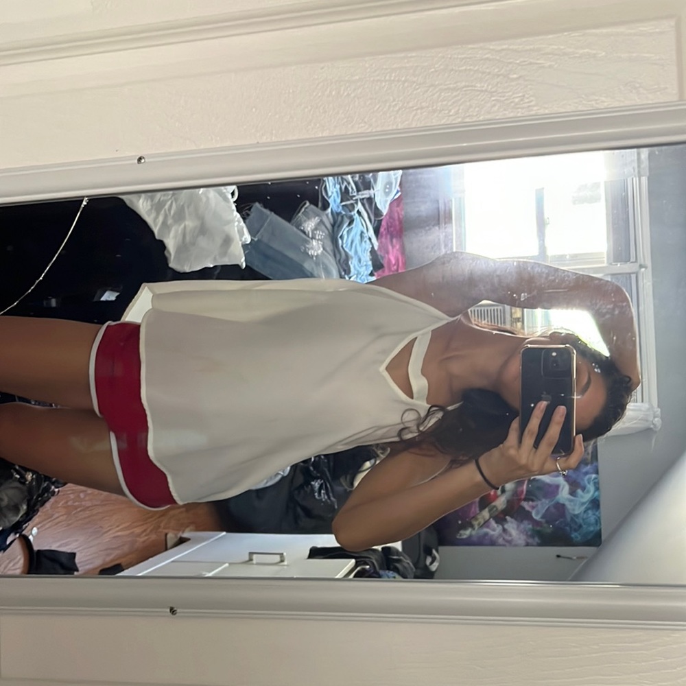 Sweet Wanderer Medium Cream color shirt. Tiny stain.